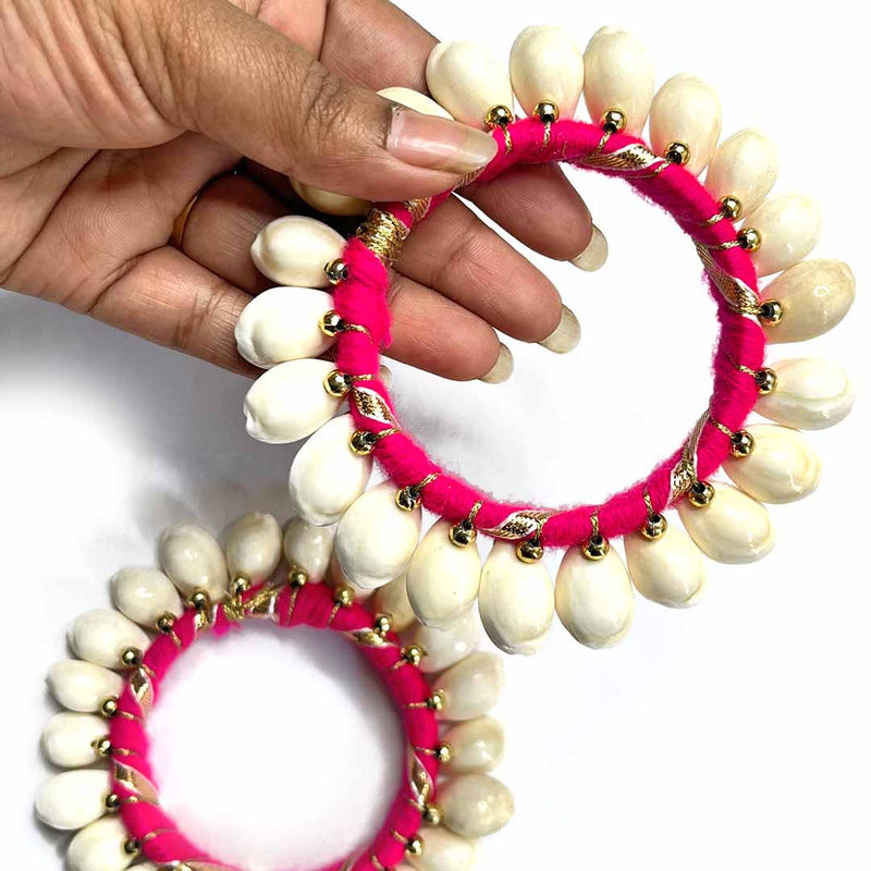 Houri Life - She wears sea shells 🐚... The Cowrie / Kaudi shell bracelet.  Cowrie Shell was a form of currency in various regions of the world. The  Cowrie shells represent goddess